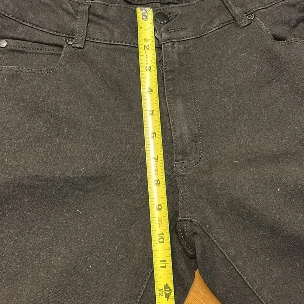 Women’s black skinny jeans size 10.